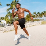 elite sports athlete running on private beach