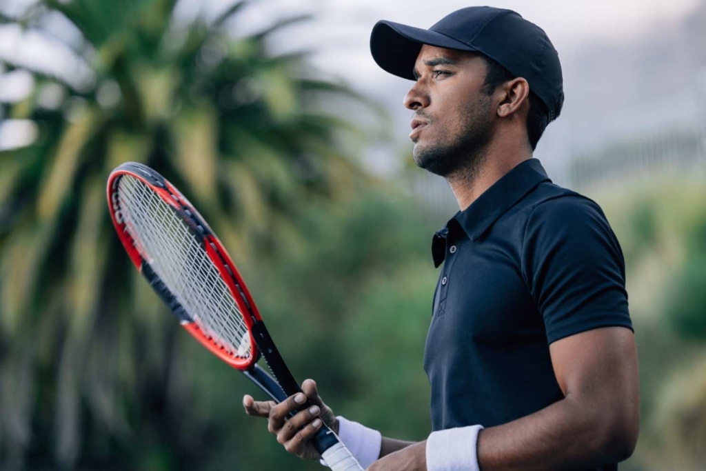 sports tennis coach training with athlete